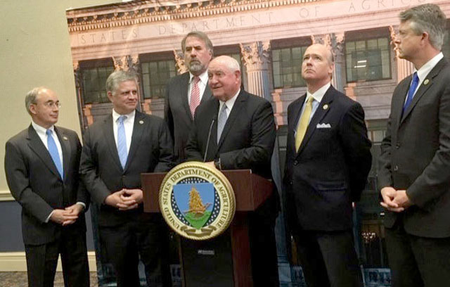 Agriculture Secretary Sonny Perdue is surrounded by Republican House members at a news conference about rural e-connectivity. From left, Republican Reps. Bruce Poliquin of Maine, Drew Ferguson of Georgia, Doug LaMalfa of California, Perdue, House Agriculture Appropriations Subcommittee Chairman Robert Aderholt of Alabama and Roger Marshall of Kansas. (Photo by Jerry Hagstrom for DTN)